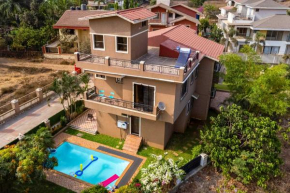 StayVista's Moonlit Hills - Retreat with Pool, Scenic View, and Indoor Games